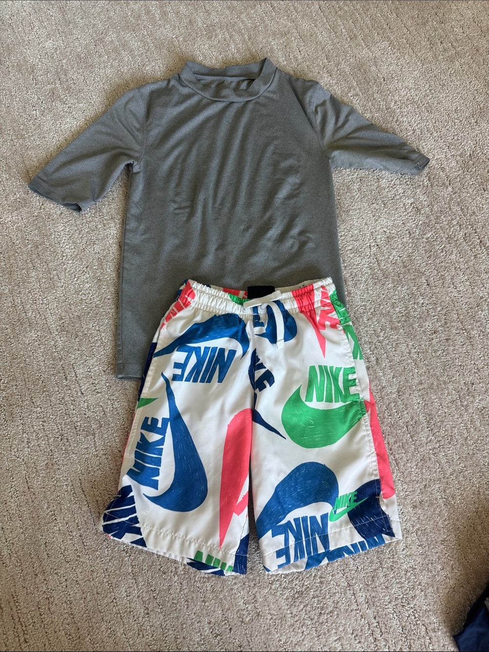 Nike White Swim Shorts with Blue, Green and Pink Logo Print